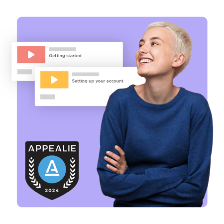 Head of Customer Education standing near two customer onboarding task thumbnails, with an Appealie 2024 award nearby.