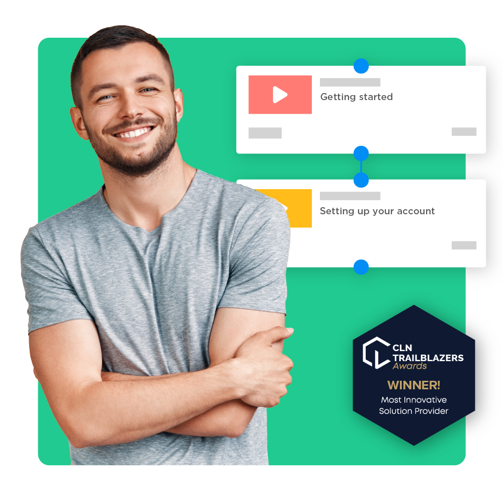 Smiling IT Manager standing near the CLN Trailblazers awards logo, with two video assets connected through a workflow.