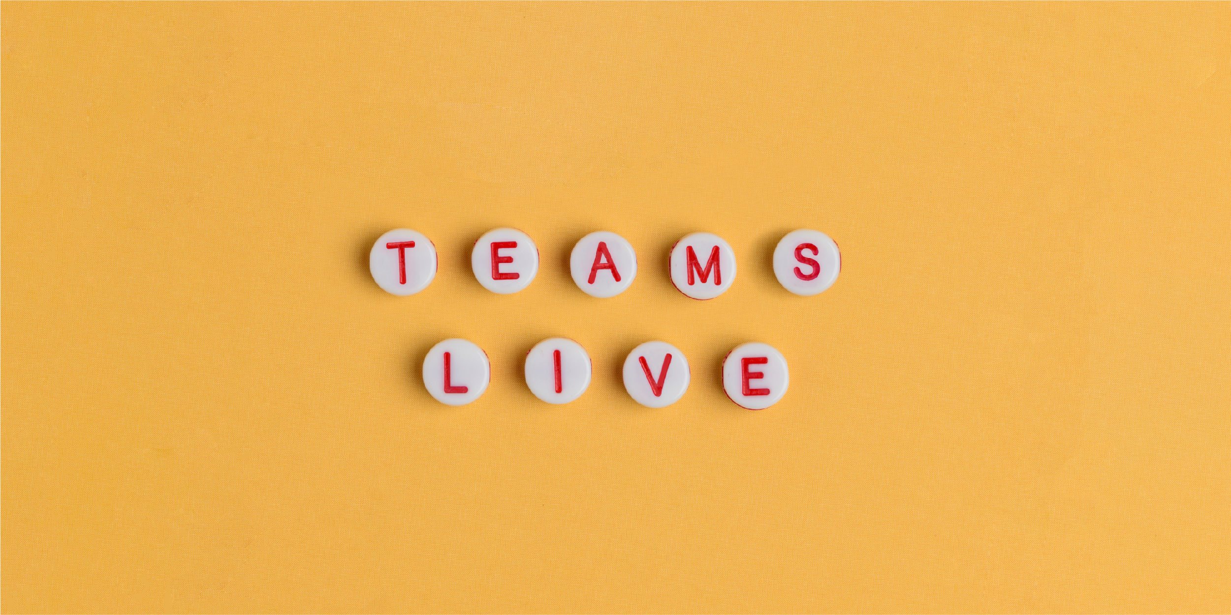 "Teams Live" spelled out in white beads with red letters