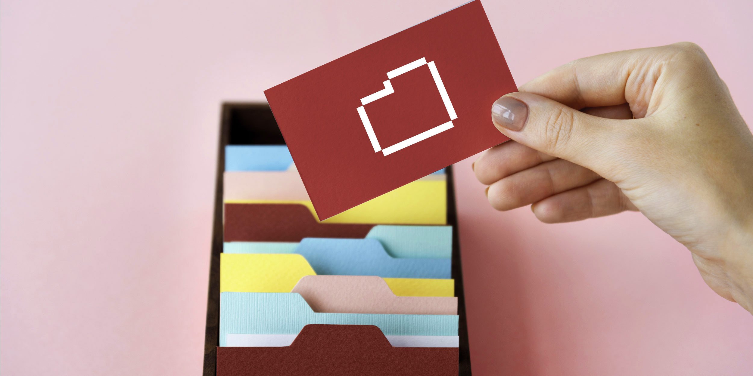 A woman holding a red paper with a white folder image