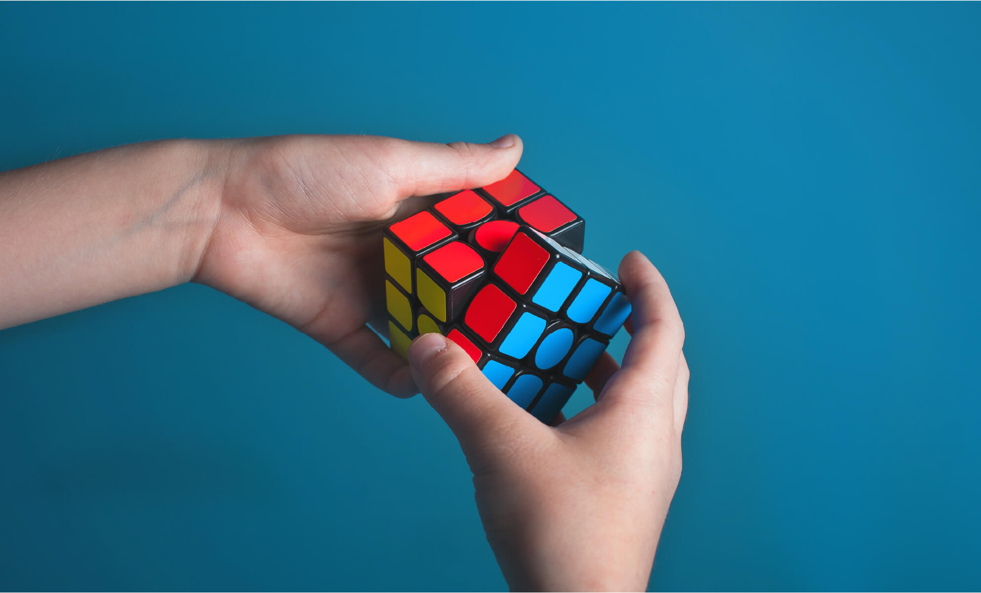 Frustration - Someone solving a Rubik's cube